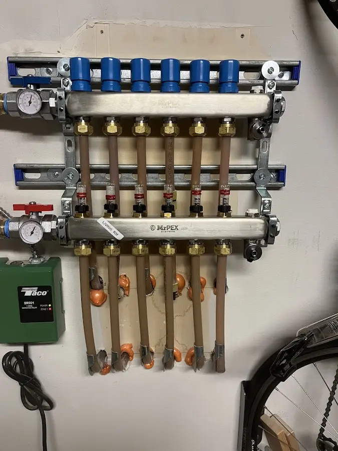 Plumber performing Water Heater Repair at a residential property in Lake Wisconsin